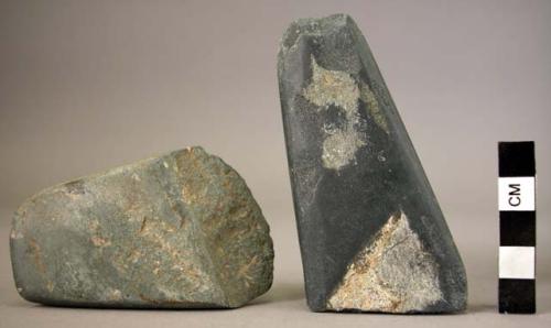 2 stone axes 8 and 9 cm. long