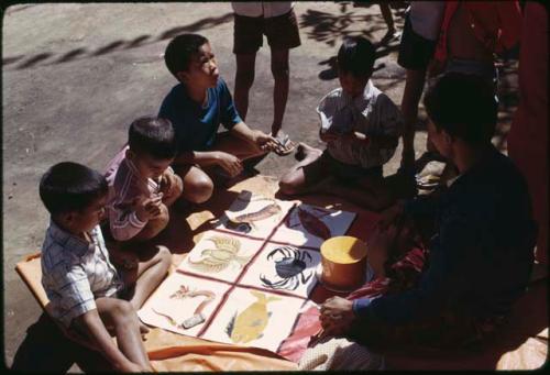 Gambling at temple, Kuningan