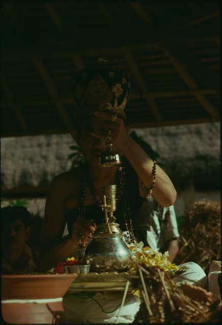 Priest officiating Naga Banda ceremony