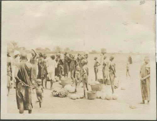 South from Mongalla to Rejaf, view of large crowd standing ashore the Nile River