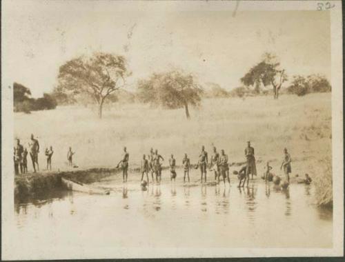 Approaching Rejaf, view of crowd wading in the Nile River