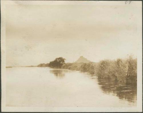 View of hill at Rejaf, the farthest point upstream the boat reaches before the party leaves the Nile River and heads southwest into Belgian Congo