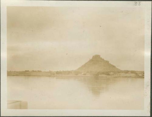 View of hill at Rejaf, the farthest point upstream the boat reaches before the party leaves the Nile River and heads southwest into Belgian Congo