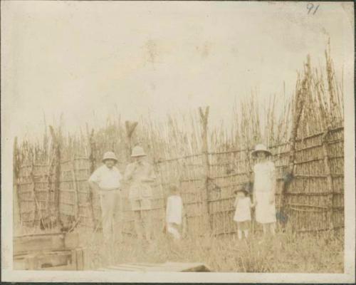 Group photograph of M. Bonnivair, Baron van Zuylen, Baroness van Zuylen, and the Zuylen's two young daughters at Feradje, a post in the Belgian Congo