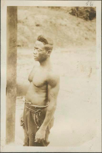 On the Aruwimi River between Buta and Stanleyville, man in profile view