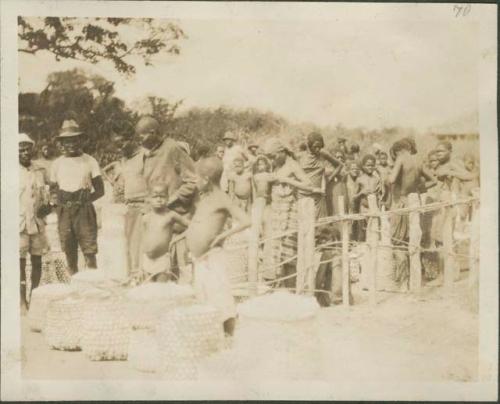 Monga, most northernly important post, men and women with cotton bales