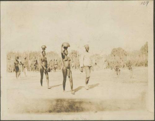 Women carrying water