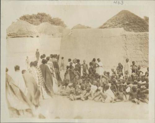 Children watching the women's dance