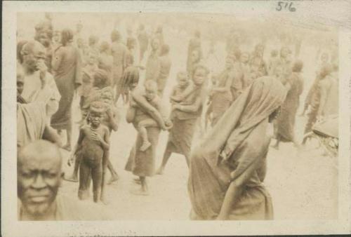 Crowd of people in village