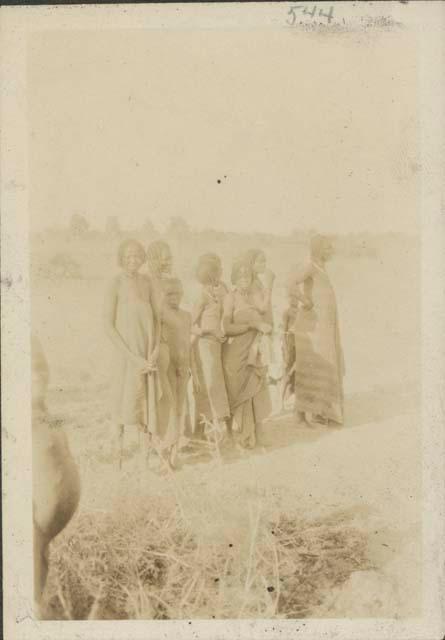 Group of women and children getting water