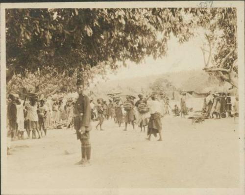 Policeman and crowd of people