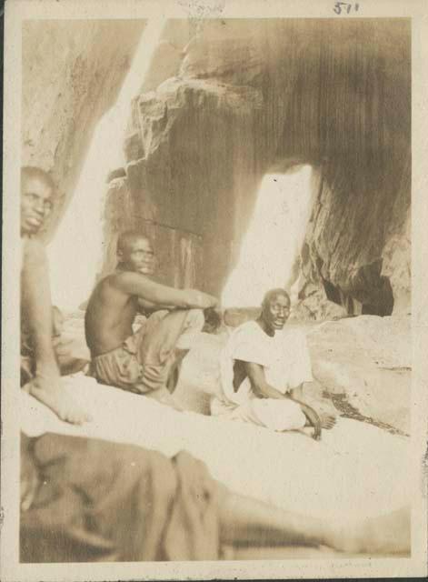 Men inside cave