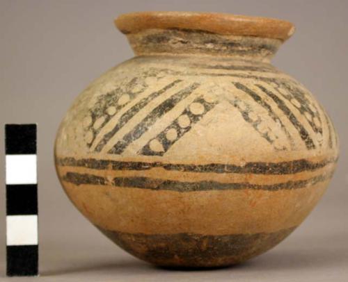 Pottery jar, yellow with blcak ornamentation