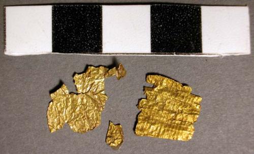 Three pieces of thin gold plate