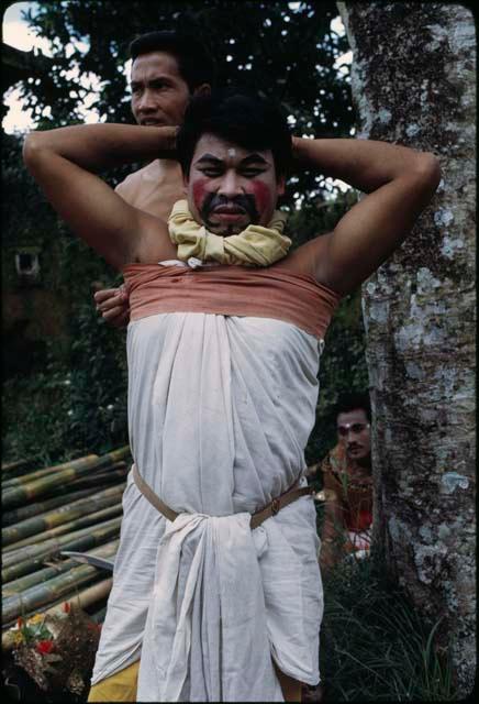 Ketjak dancer dressing for performance