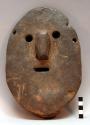Wooden mask (kolyon) - stands for an evil spirit; still worn occasion-+