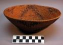 Basketry bowl. three-lobed motif.