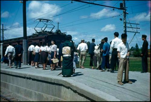 People waiting on train platform