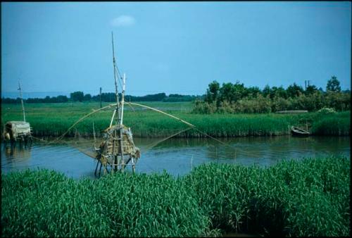 Fishing structure with net in canal