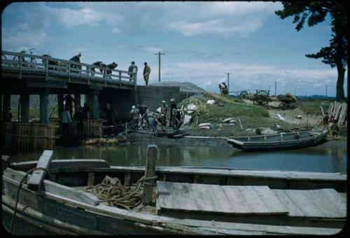 Boat, with bridge in background