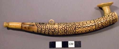 Walrus ivory pipe - decorated in small circles, some overlapping