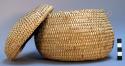 Basket with cover called longo, in old days made by menbers of either +