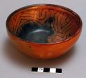 Painted pttery bowl - red, dark brown yellow brown