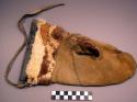 Man's moose skin mitts. Wrists ornamented with strips of mink and ermine skin