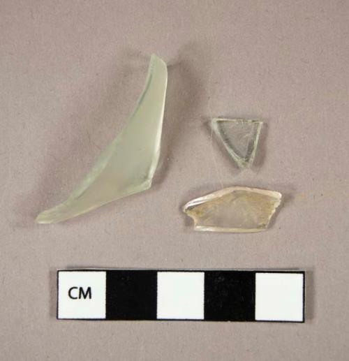 Glass, curved, clear (1), aqua (2), fragments