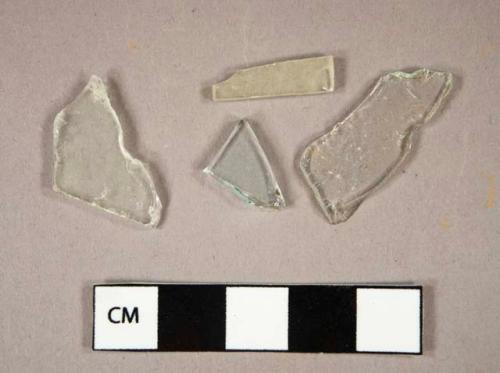 Glass, flat, aqua (12) and clear (4), fragments