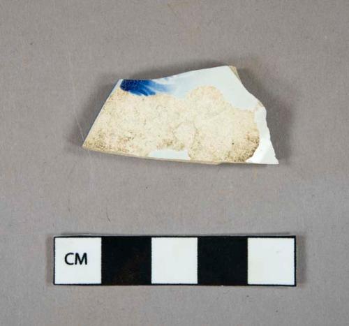 Ceramic, earthenware, pearlware, shell edge, blue decoration, rim sherd