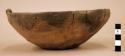 Plain pottery bowl, inverted rim, perforated lug on horizontal plane of the rim