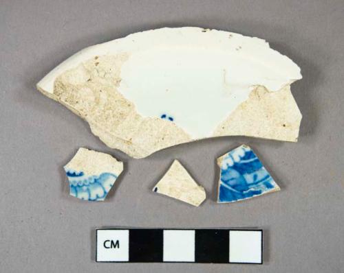 Ceramic, earthenware, pearlware (6), whiteware (2), blue transfer printed pearlware (4), body sherds; brown transfer printed pearlware (1), rim sherd