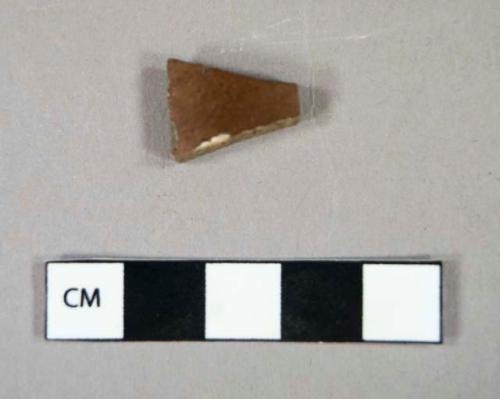 Ceramic, stoneware, brown lead glaze, body sherd