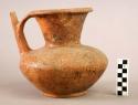 Pottery jar with spout - red