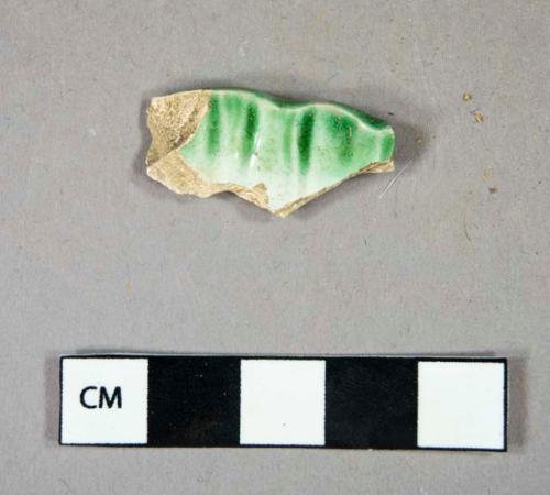 Ceramic, refined earthenware, green shell edged pearlware rim sherd