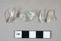 Glass, colorless bottle fragments