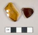 Glass, curved, brown, fragments