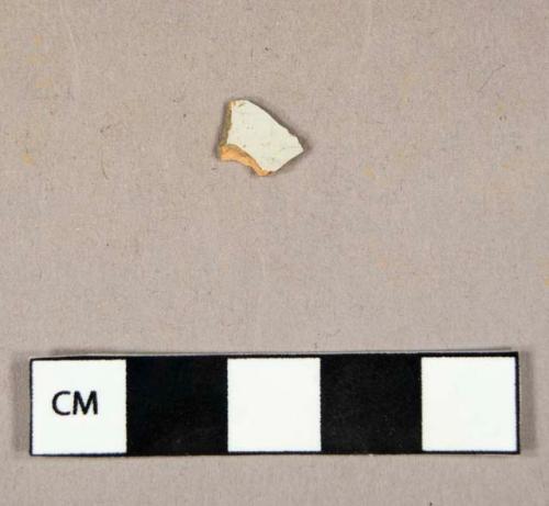 Ceramic, coarse earthenware, red bodied tin glaze body sherd