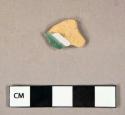 Ceramic, coarse earthenware, green painted tin glaze body sherd