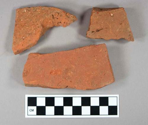 Brick fragments, including roofing tile