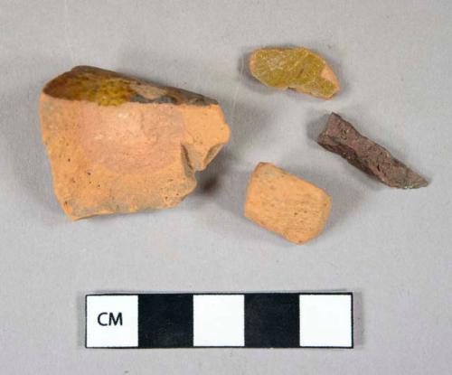 Ceramic, earthenware, redware, lead glaze, brown, green and unglazed, body sherds