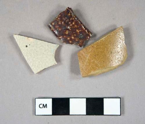 Ceramic, stoneware, salt glazed, brown and grey; earthenware, manganese mottled. Body sherds.