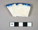 Ceramic, earthenware, pearlware, blue feather edge, rim sherd