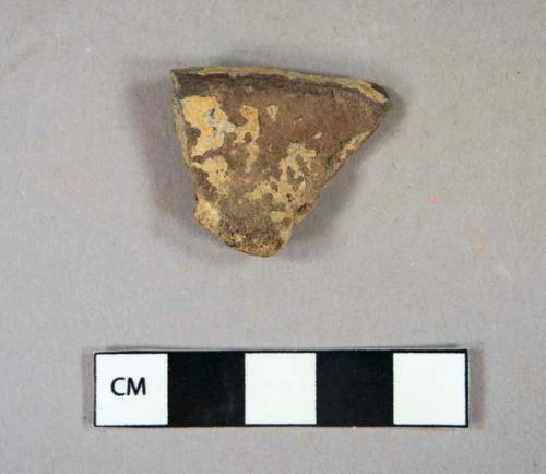 Ceramic, coarse earthenware, burnt redware rim sherd