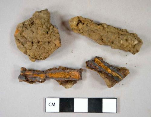 Ferrous metal, nail fragments, including cut nails