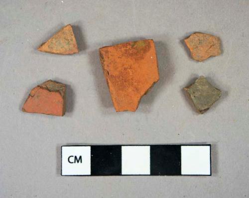 Ceramic, coarse earthenware, redware body sherds and brick fragments