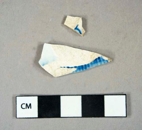 Ceramic, refined earthenware, blue shell-edge pearlware rim and body sherds