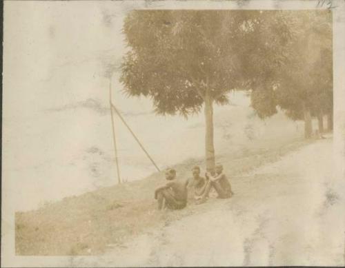 Group sitting next to Ubangui River