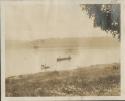 Two people in boat on Ubangui River